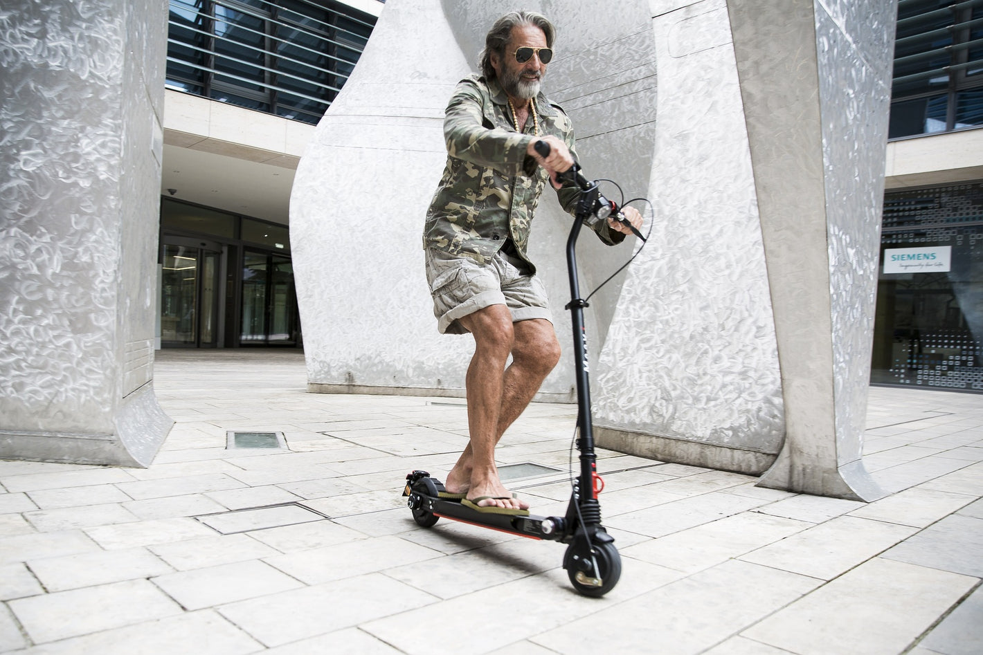 Category Emobility - E-Scooter with Man